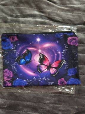 Canvas Zipper Pouch Featuring Butterflies And A Heart On A Purple Background
